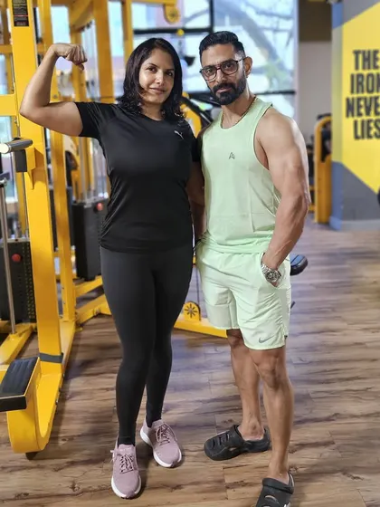 Here I am with my client after her 12-week transformation. Her hard work and my guidance created a winning team, resulting in a healthier, stronger body.