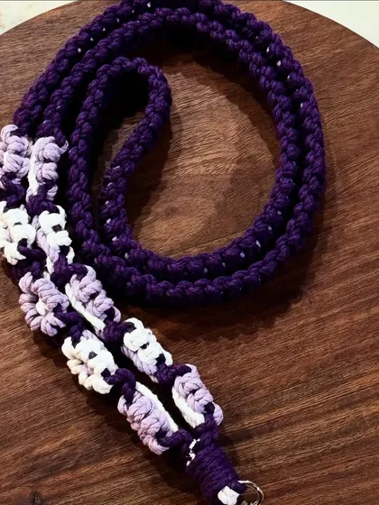 A designer mobile lanyard in purple with white and lavender flower details. Carry your mobile in style with my handcrafted slings.