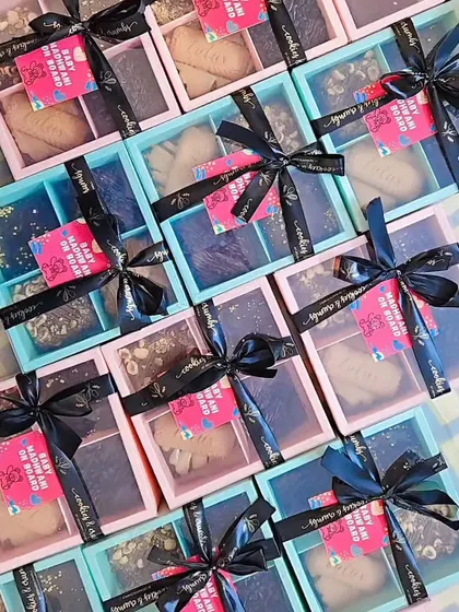 These assorted brownie boxes were made as return favors for a baby shower. The pink and blue boxes with the "Baby on Board" tags were such a cute touch.