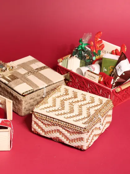A festive array of images showcasing my Christmas collection, including close-ups of candles, luxury items, and various hamper styles.
