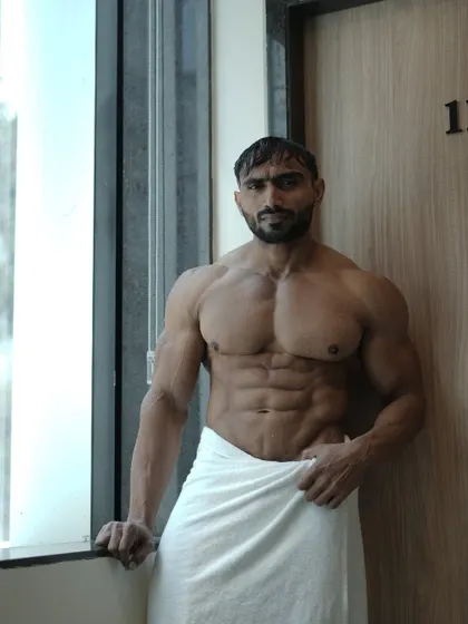 A confident pose in the towel.
