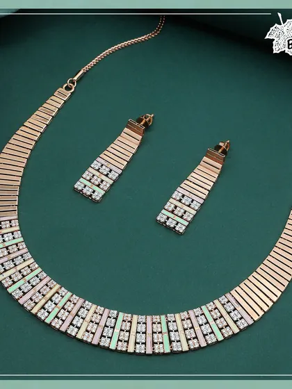 The Fusion Rose Gold set, a harmony of modern edge and soft color. This necklace features articulated panels of polished rose gold, brilliant diamonds, and pastel-toned Meenakari enamel work.