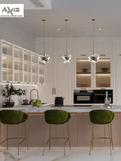 The kitchen is the creative heart of the home. I designed this space to blend sleek elegance with flawless functionality, featuring an island with a breakfast bar, modern pendant lighting, and ample frosted glass cabinetry for a clean, organized look.