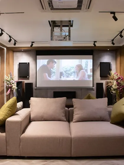 One of our comfortable demo rooms, designed to replicate a real living room environment. Here you can experience how high-performance audio and video integrate into a stylish living space.