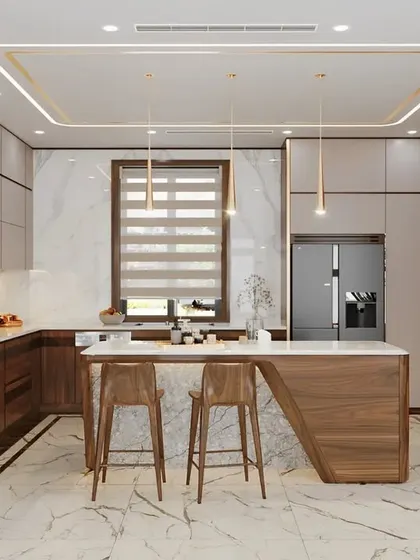 An expansive kitchen featuring wood and white cabinets, a marble-topped island with a unique waterfall edge, and a full-height glass-door pantry. The design is both luxurious and highly practical.