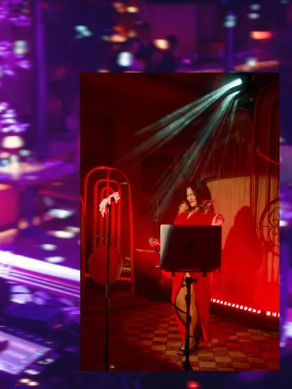 A dramatic shot of our live performers at SWITCH. The lighting and stage setup are designed to create an immersive experience for our guests.