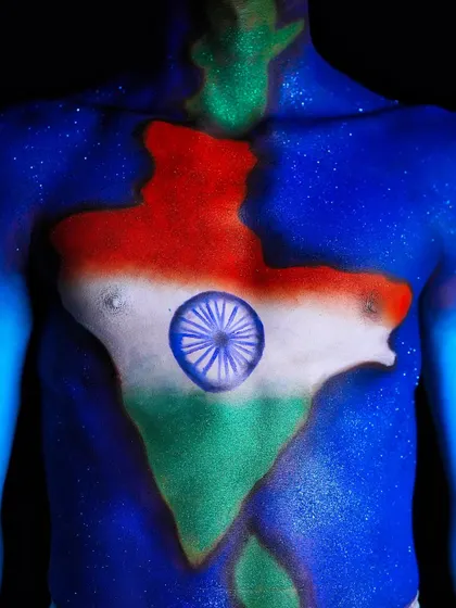 A powerful Republic Day look featuring the map of India painted on the chest. This is a great example of patriotic body art.