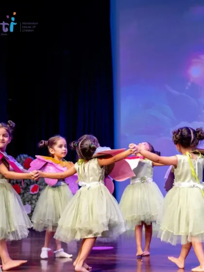 Our "talking flowers" perform a graceful dance. The choreography and costumes for our Annual Day are thoughtfully designed for our young performers.