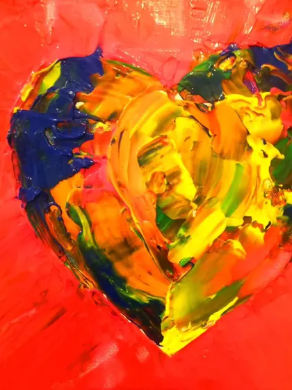 A detailed shot of the "Apples and Oranges" heart. This piece is about self-love and breaking free from moulds. The clashing and blending of colors represents the beauty of being your authentic self.