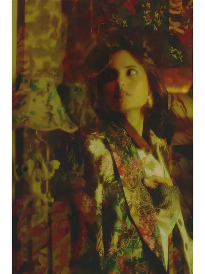 Another image from "Love in Future Past," using hazy, warm tones to evoke a dreamlike state of memory. This cinematic lighting is a key element I teach in my fashion photography workshops.