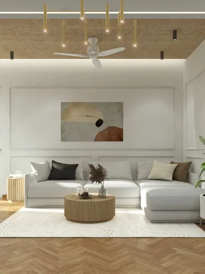A slightly different angle of the cozy family room, showing the clean white walls with classic moulding that adds a touch of elegance.