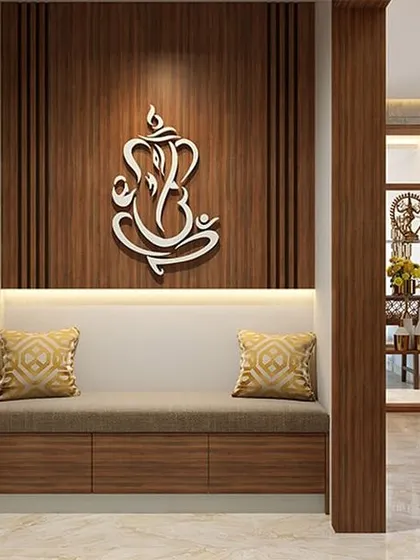 A welcoming entryway with a comfortable bench seat, perfect for putting on shoes. The Ganesha wall art and wood slat panel create a warm and spiritual first impression.
