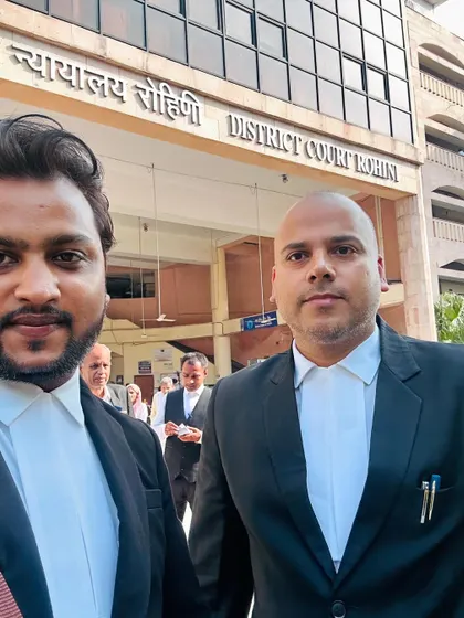 A selfie with a colleague outside the District Court Rohini. Collaboration and a strong network are essential in the legal profession.