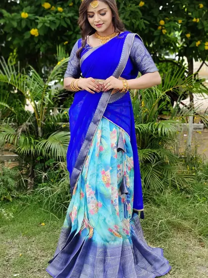 A full-length view of the modern blue Langa Davani, perfect for an outdoor event.