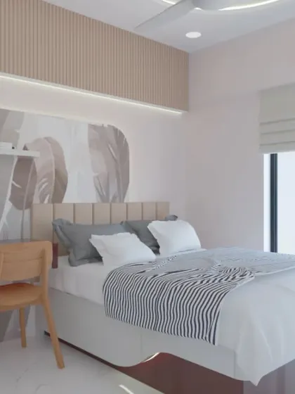 A closer view of the study desk integrated next to the bed in this calming room concept.