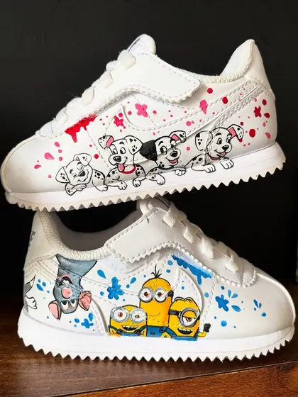 A full view of the mismatched kids' sneakers, with 101 Dalmatians and Minions. Such a fun and playful custom shoe design.