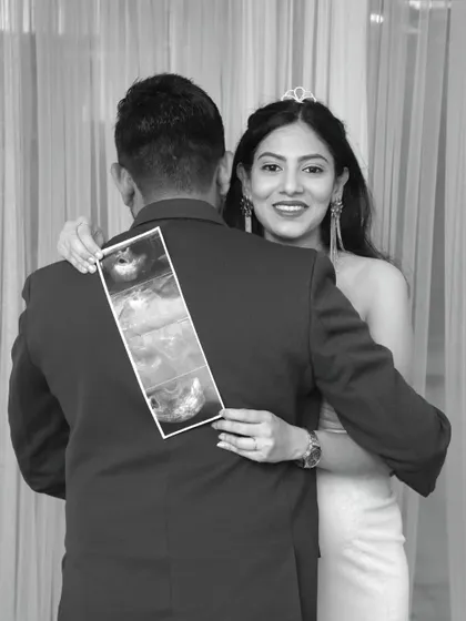 Your story, your props. We love to personalize your maternity photoshoot by including meaningful items, like the very first sonogram pictures of your baby. This black and white shot adds a timeless, artistic feel.