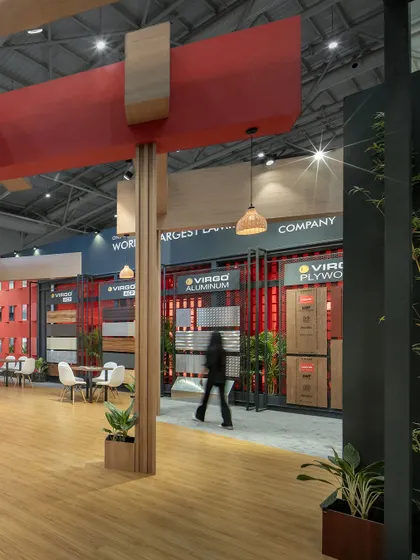 A view across the main floor of the Virgo exhibition space, showing how the design facilitates visitor flow. The open layout allows for easy navigation between product displays and seating areas.