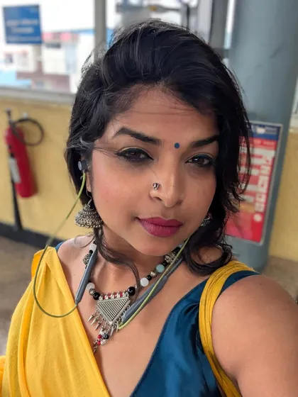 A selfie from a day out. My personal style and my art are often intertwined, both full of color and expression.