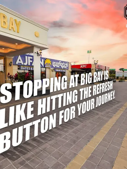Stopping at Big Bay is like hitting the refresh button for your journey. The view of our storefronts against a sunset sky is the perfect backdrop for a relaxing break.