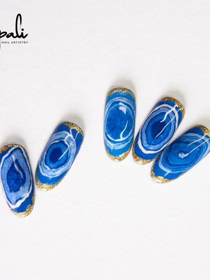 Another angle of the 'sea effect' nails. The way the colors blend together creates a mesmerizing, natural pattern.