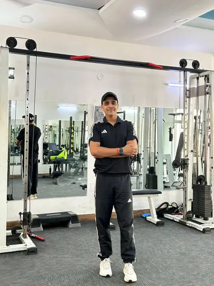 Another confident pose, reflecting my commitment to fitness.