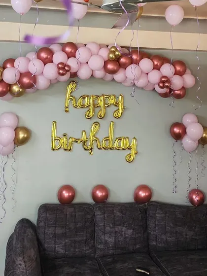 This simple yet beautiful setup is perfect for a surprise birthday decoration at home.