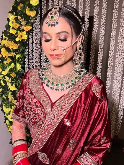 A close-up of Pratibha's eye makeup. The soft brown and gold tones make her eyes pop, while the flawless base gives her skin a healthy, radiant glow.