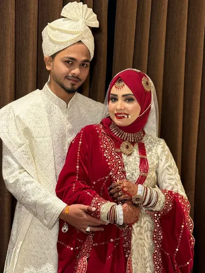 This royal couple looks picture-perfect. The bride's makeup is bold and beautiful, making her stand out while complementing her groom.