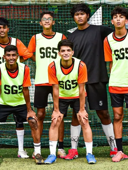 Our older players in training bibs, demonstrating leadership and camaraderie.