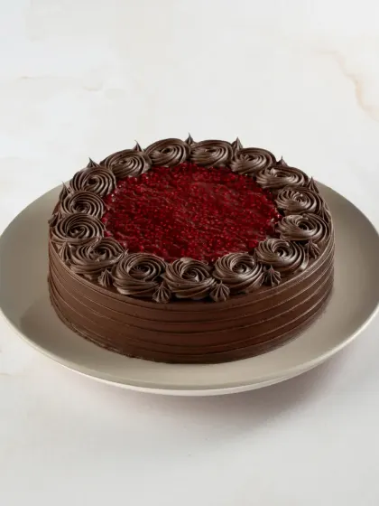 Our Lite Raspberry Traditional Chocolate Gateau features a rich raspberry filling that provides a wonderful tartness against the deep chocolate cake.