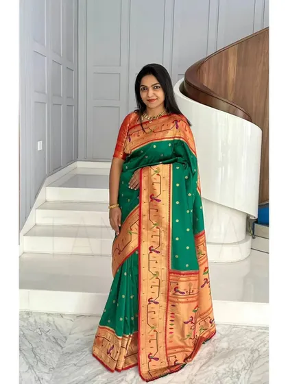 Another shot of the client looking elegant in her Paithani saree and custom blouse, a perfect ensemble for a traditional ceremony.
