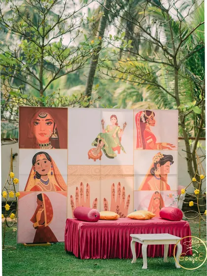 The artistic and personalized backdrop for a Mehendi ceremony, providing a beautiful photo opportunity.