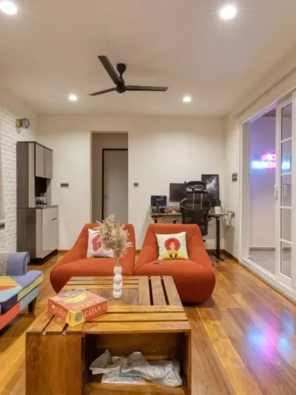 The multipurpose room on the terrace is a vibrant, colorful space that opens directly onto the outdoor area, blending indoor comfort with outdoor freedom.