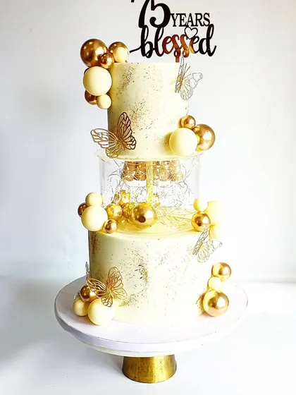 This elegant white and gold design is perfect for celebrating golden anniversaries or any major milestone in style.