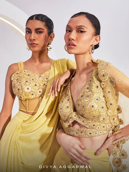 A group shot featuring the Lydia Cape Set and Isla Saree Set, sparking inspiration with their exquisite craftsmanship and modern design.