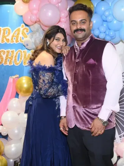 A lovely portrait of the expecting couple at their baby shower. I make sure to capture the couple together against the beautiful decor, documenting this special milestone.