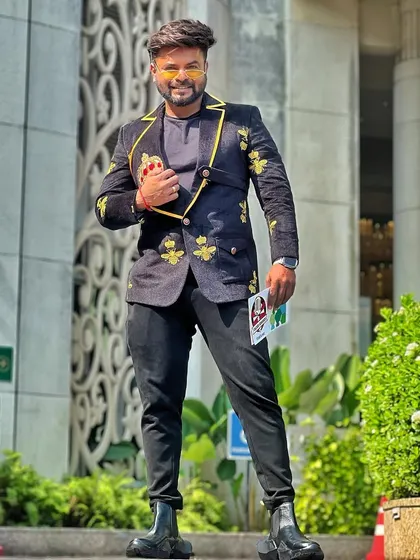 A cheerful pose in my custom-designed blazer.