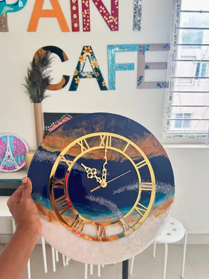 A repeat of the stunning sunset-over-ocean resin clock.