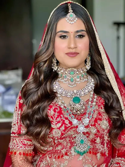 A detailed shot of the makeup for this royal bride. The soft smokey eye and perfectly blended skin create a look that is both glamorous and refined.