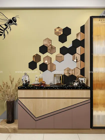 A unique bar and crockery unit inspired by bees and honeycombs. The hexagonal mirrors and bee decal create a playful and artistic focal point in the dining area.
