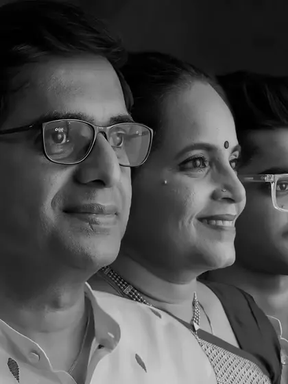 A modern and artistic family portrait for a 25th anniversary, where the black and white edit adds a touch of sophistication.