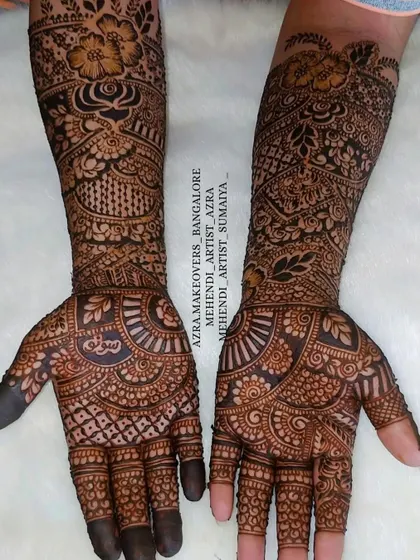 This Indo-Arabic bridal design features a mix of bold floral work and traditional Indian patterns.
