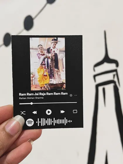 This Spotify card features a traditional Marathi wedding photo paired with a devotional song. It’s a wonderful way to commemorate a sacred moment.