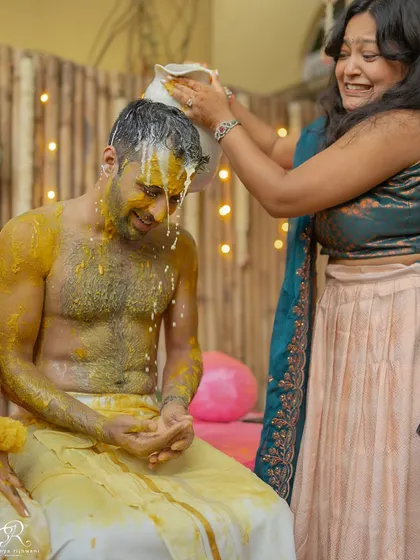 More fun and splashing during the Haldi ceremony. The more the mess, the better the photos.