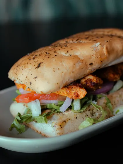 We're bringing an Indian twist to the classic Italian sandwich with our Chicken Tikka Panini. It's packed with tender chicken tikka and fresh veggies in a toasted panini.
