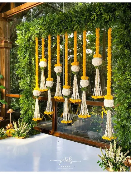A duplicate image of the engagement decor, with its beautiful combination of ferns and flowers.