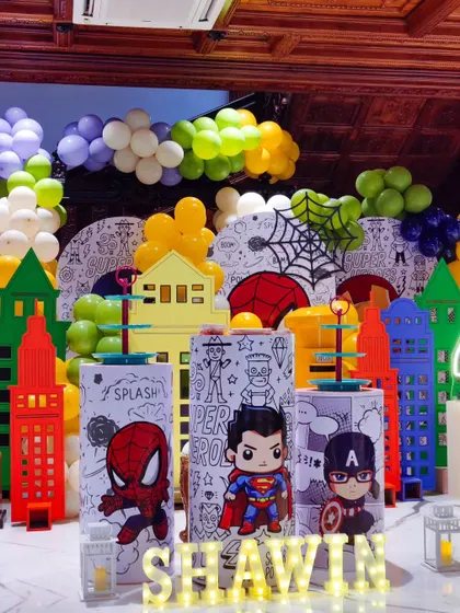 Another look at the superhero cityscape, showing the vibrant colors and dynamic composition. The light-up name in the foreground makes it a personalized centerpiece.