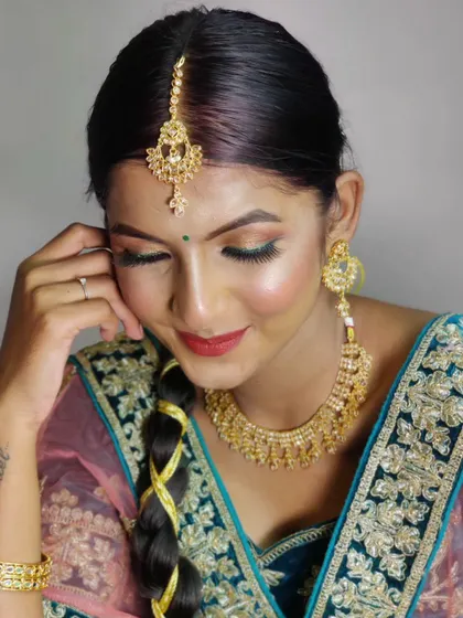 A beautiful shot from a creative shoot with model Samiksha, showcasing a soft glam look with a pop of red on the lips.