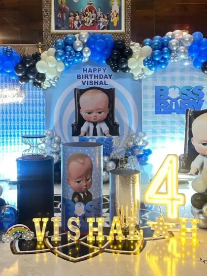 A "Boss Baby" theme is a huge hit for kids' birthdays. I designed this complete setup with life-sized character cutouts, a custom backdrop, themed plinths for the cake, and marquee lighting to make the birthday boy feel like a real boss.